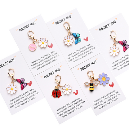 🌼🎒 Cuki rovaros margitvirág kulcstartó –✨ Vidám és egyedi design, amely azonnal feldobja a táskádat 🎁